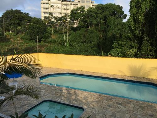 Het zwembad bij of vlak bij Acomodação no paraíso