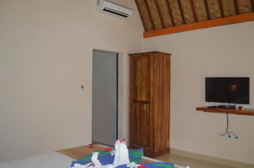TV o dispositivi per l'intrattenimento presso Penida Bay Village