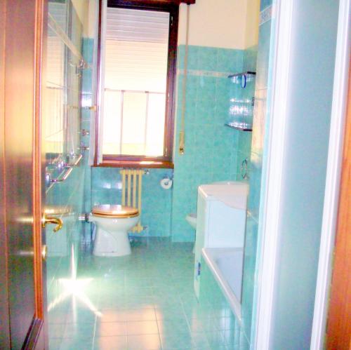 a bathroom with a toilet and a sink at Bed & Breakfast A San Siro 75 in Milan