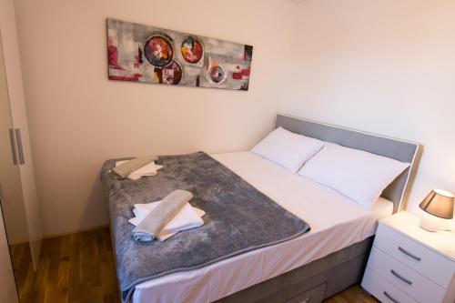 Postel nebo postele na pokoji v ubytování Lidija 2