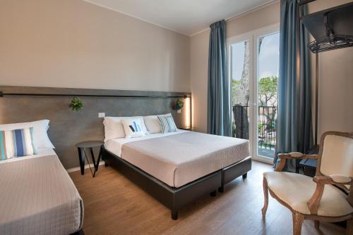 Säng eller sängar i ett rum på Hotel Vagabond