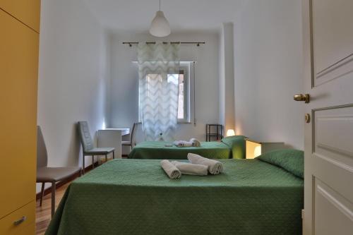 A bed or beds in a room at Ai Bastioni del Massimo