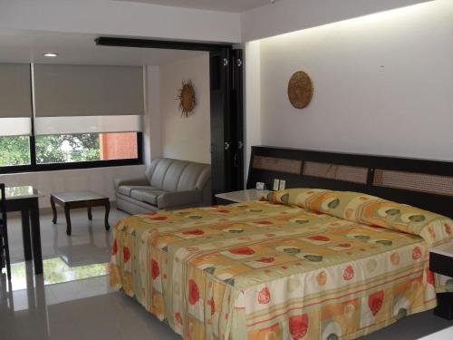 Postel nebo postele na pokoji v ubytování Hotel Playa Cristal