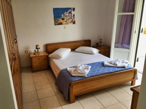 Postel nebo postele na pokoji v ubytování Anthoula's Sea View Apartment
