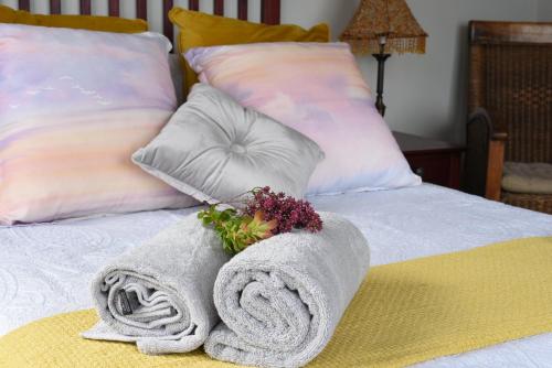 Postel nebo postele na pokoji v ubytování Zeezicht Guest House