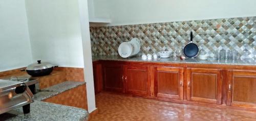 Köök või kööginurk majutusasutuses Darpana Homestay