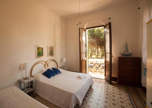 A bed or beds in a room at Villa Rosa de Mar