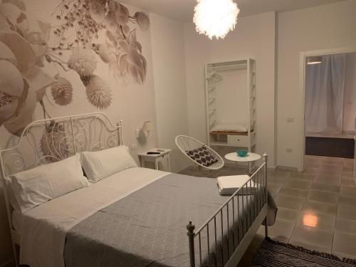 Ένα ή περισσότερα κρεβάτια σε δωμάτιο στο La Villetta B&B