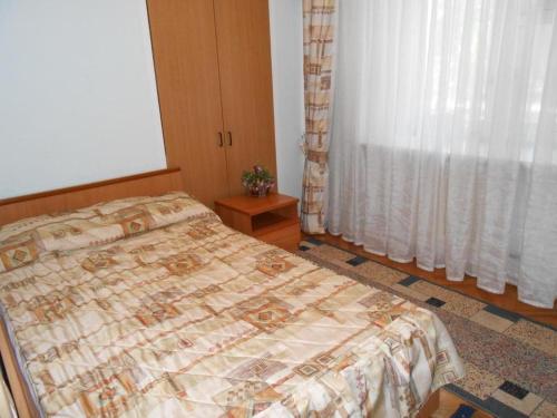 Postel nebo postele na pokoji v ubytování Zhibek Zholy Hotel