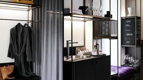 a bathroom with a sink and a shower curtain at Zagame's House in Melbourne