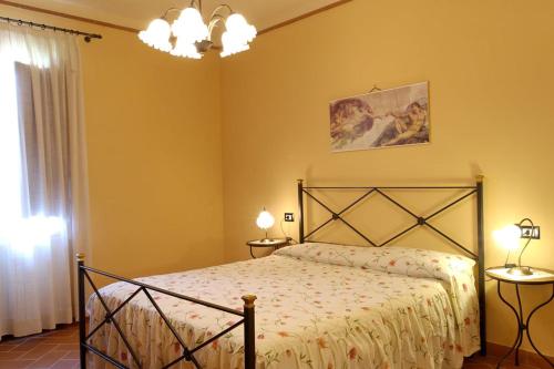 Postelja oz. postelje v sobi nastanitve Agriturismo Montemari