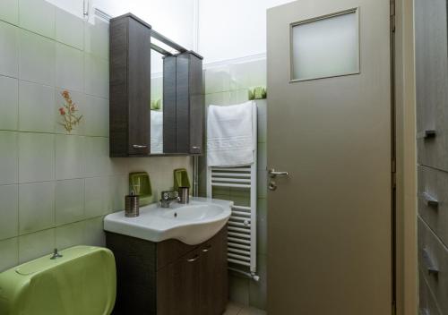 Ванная комната в Andria City Apartment