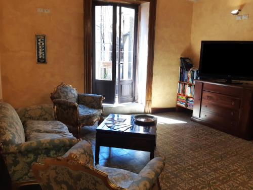 Ein Sitzbereich in der Unterkunft Antico Palazzo Affitti brevi