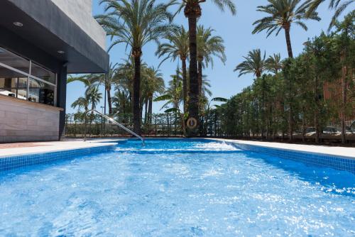 Πισίνα στο ή κοντά στο Hotel El Palmeral