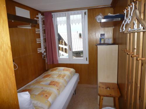Ένα ή περισσότερα κρεβάτια σε δωμάτιο στο Esthers Guesthouse
