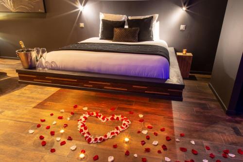 Cama o camas de una habitación en L'effet SPA