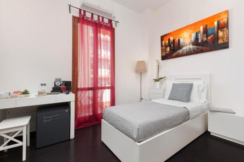 Postel nebo postele na pokoji v ubytování Hotel Herculaneum
