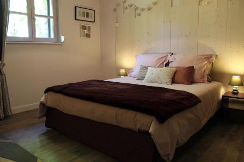 Katil atau katil-katil dalam bilik di Le Val Daninière B&B Adult only