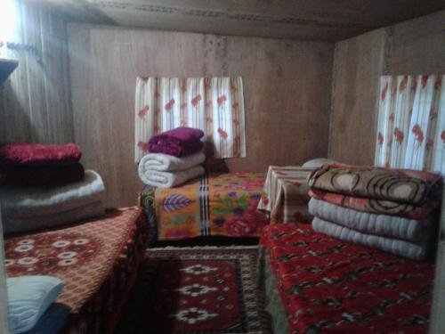 Una cama o camas en una habitación de Chintapu Homestay In Maipokhari, Sandakpur Ilam