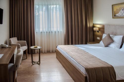 Postel nebo postele na pokoji v ubytování Villa Ruža