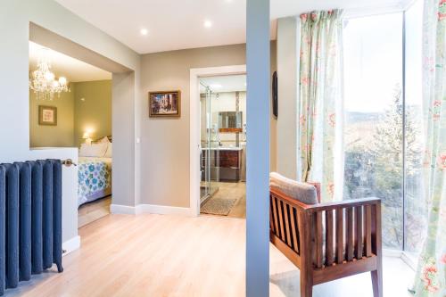 two images of a room with a radiator and a bedroom at B&B Concha in Becerril de la Sierra