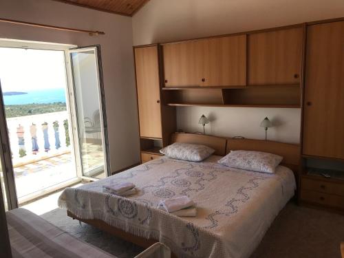 Postel nebo postele na pokoji v ubytování Apartment Santa Marina