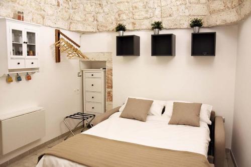 Postel nebo postele na pokoji v ubytování Pietralta