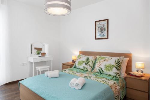 Posteľ alebo postele v izbe v ubytovaní Comfortable 3-Bedroom Apartment with Balcony and Fast Wi-Fi - 10 Minutes from Old Town