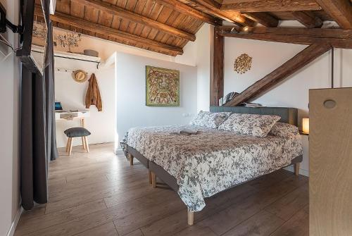 En eller flere senger på et rom på Barchessa Rossetti