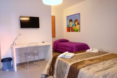 Cama o camas de una habitación en Sogni D'Oro