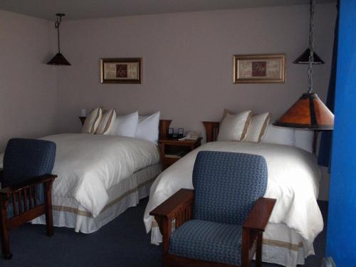 מיטה או מיטות בחדר ב-Surf Inn