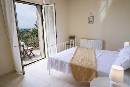 Ένα ή περισσότερα κρεβάτια σε δωμάτιο στο Villa CLEO