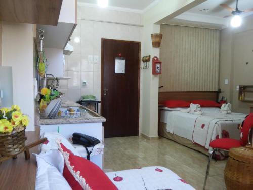 Un ou plusieurs lits dans un hébergement de l'établissement Apart Hotel em Caxambu207