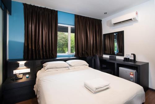 Posteľ alebo postele v izbe v ubytovaní Hotel Waterfall
