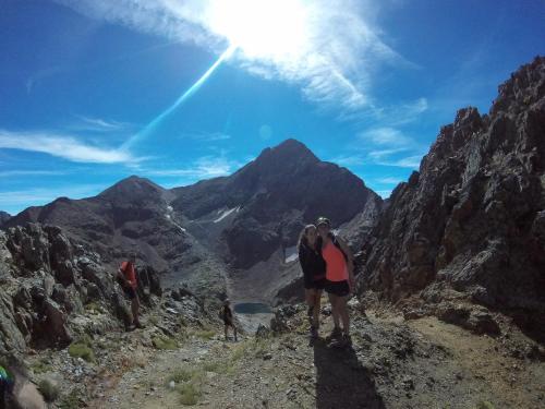 a group of people standing on top of a mountain at Hotel Llacs De Cardos in Tavascan