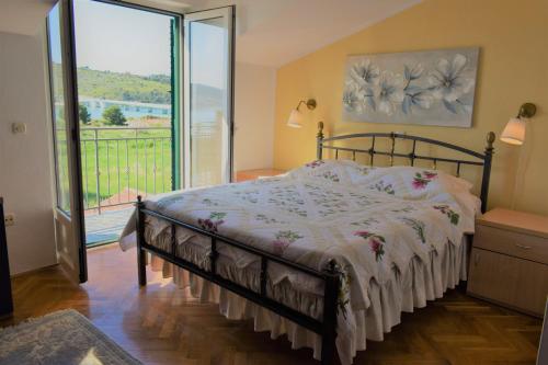Ένα ή περισσότερα κρεβάτια σε δωμάτιο στο Anita Apartments