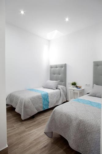Cama o camas de una habitación en EL PALOMAR