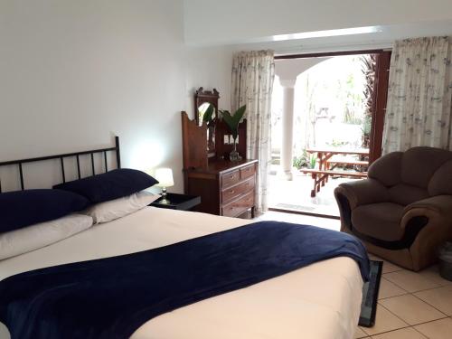 Knysna N2 Lodgeにあるベッド