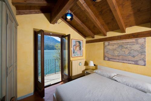 Ένα ή περισσότερα κρεβάτια σε δωμάτιο στο VIOLINA casa vacanze