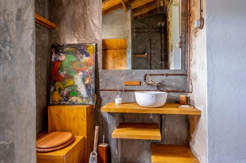 Een badkamer bij Terra Lodge