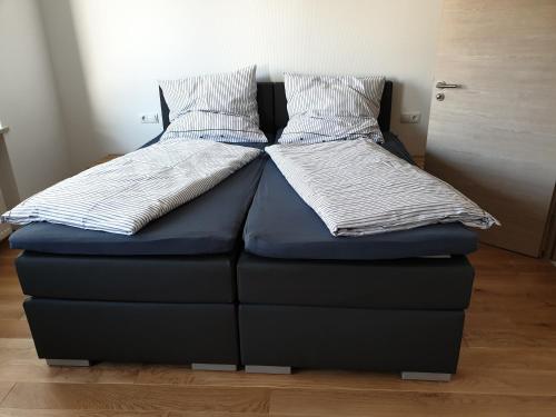 Cama ou camas em um quarto em Beim Hooch. Egon