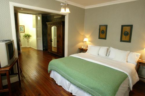 Katil atau katil-katil dalam bilik di Hotel del Casco