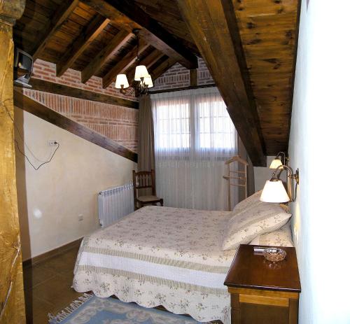 Ένα ή περισσότερα κρεβάτια σε δωμάτιο στο Casa Paulino