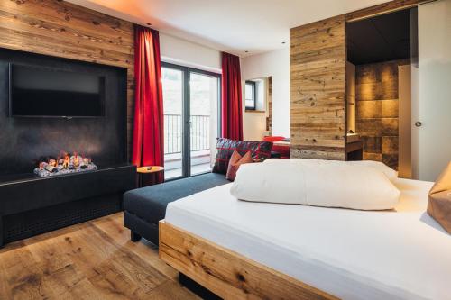 Postel nebo postele na pokoji v ubytování Hotel Cores