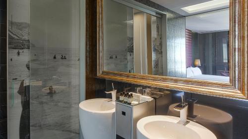 Ein Badezimmer in der Unterkunft Hotel MiM Sitges & Spa