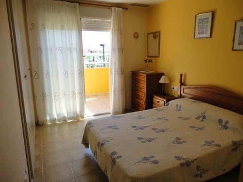 Postel nebo postele na pokoji v ubytování Urbanización Sueños de Denia II