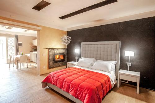 Ein Bett oder Betten in einem Zimmer der Unterkunft Relais I Piastroni
