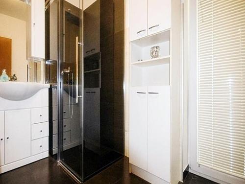 A bathroom at Apartments Radmila