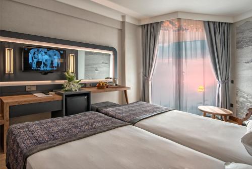 Krevet ili kreveti u jedinici u objektu Riviera Zen Hotel Adult Only
