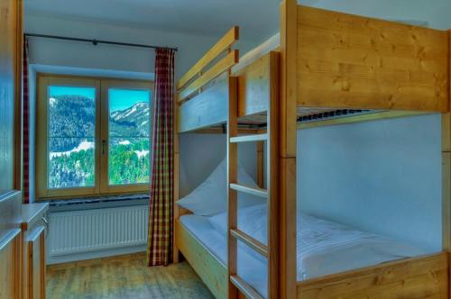 Cama o camas de una habitación en Ferien-Schlössle Michaela